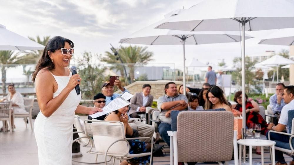 Special event photography at the Gaylord Hotel capturing City Manager speaking to an engaged audience