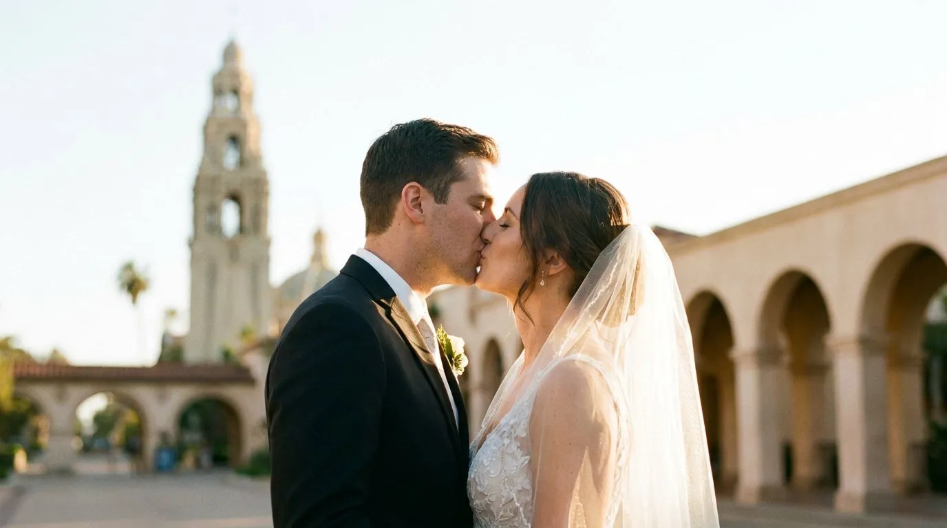 San Diego wedding photographer, couple kissing at Balboa Park at golden hour